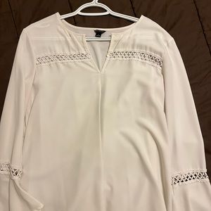 Ann Taylor size small white flowy shirt. Very comfortable.
